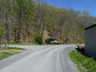 Bare right at the intersection of Griffith Creek Rd. and you will soon reach the river.